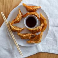 Potstickers · Chicken and vegetables, served with soy vinaigrette.