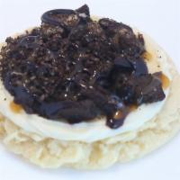 Oreo Sugar · Vanilla sugar cookie with caramel drizzle, crushed Oreos and topped with chocolate drizzle.