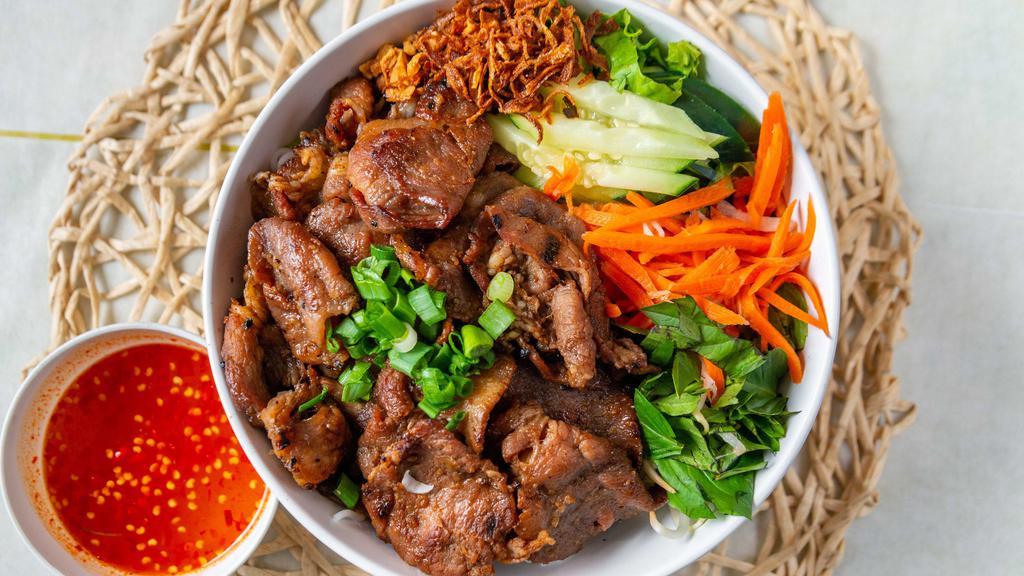 Bún Thịt Nướng - Grill Pork Vermicelli Bowl · Grill pork vermicelli. Vermicelli noodle and grill pork with assorted vegetable top with peanut and fried onion