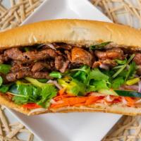 Grill Pork Sandwich · Grill pork sandwich (Serve with Cilantro, Jalapeño, Pickles Daikon Onion & Carrot, Tomatoes,...