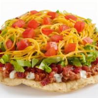Double Bacon Blt Crunchtada · A thick, wavy, crunchy corn shell is layered with slow-cooked beans made from scratch, doubl...