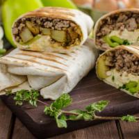 Steak And Eggs Breakfast Burrito · Juicy steak, fresh eggs, and cheese wrapped in a large warm flour tortilla.