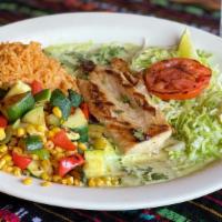 Grilled Fish Platter With Jalapeño - Lime Sauce · Seasonal fish fillet grilled  and served complete with Spanish rice, calabacitas and warm to...