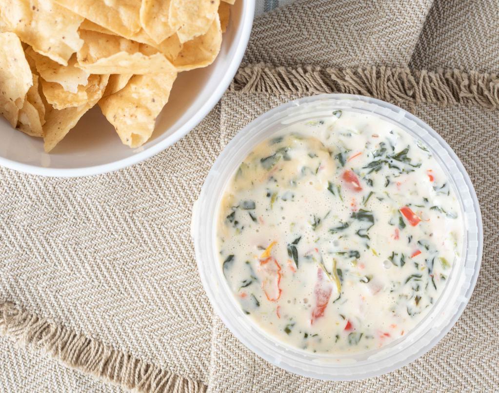 Spinach Con Queso · Jalapeno - Jack cheese melted with spinach, onions, red peppers and tomatoes.