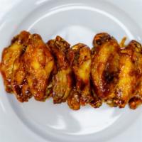 Chicken Wings  · 10 crispy fried JUMBO chicken wings with your choice of sauce or garlic parmesan seasoning! ...