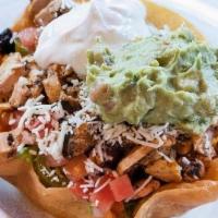 Traditional Taco Salad · Romaine, black beans, three cheeses, corn, jalapeños, tomatoes, green onions, pico de gallo,...