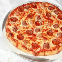 Meat Lovers · Pepperoni, salami, linguica, sausage, ground beef, Canadian bacon, homemade pizza sauce.