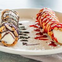 Cannoli Raspberry/Chocolate · Cylindrical Sicilian style pastry shells filled with a creamy ricotta and chocolate chip fil...