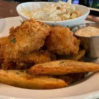 Fish & Chips · Tempura battered Atlantic cod,  French fries, coleslaw, and tartar sauce.