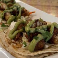 Shrimp Tacos · 3 Street tacos, blackened shrimp, lime-jalapeno slaw, avocado espuma