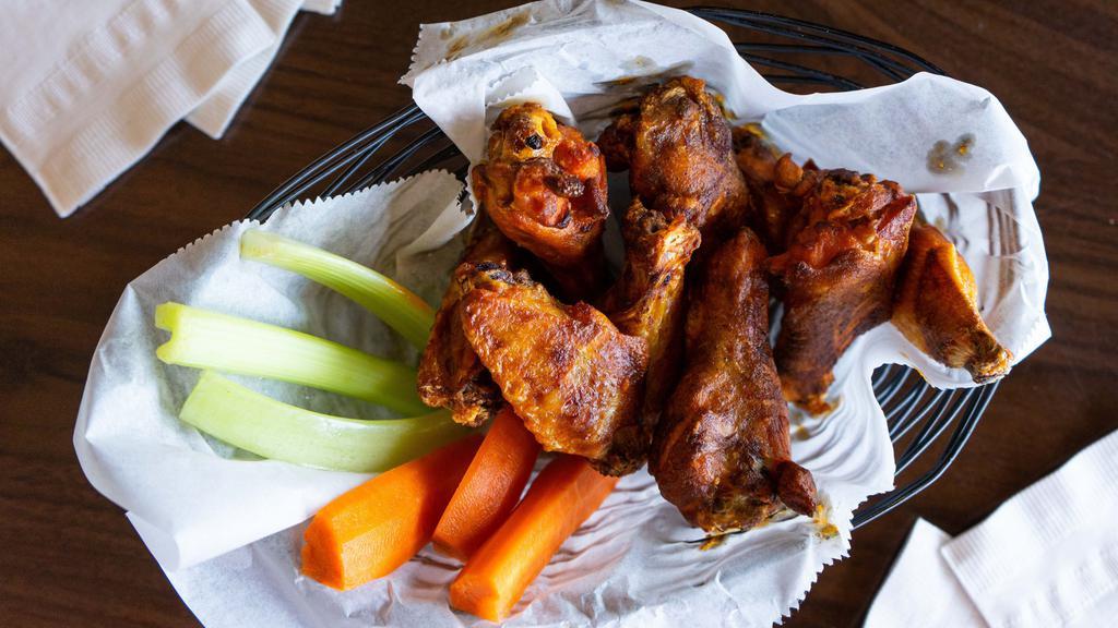 Smoked Chicken Wings · Dry Rubs: Korean BBQ | Mango Chipotle | Charcoal Mesquite
Sauces: BBQ | Spicy BBQ | Classic Buffalo | Maple Sriracha | Honey Chipotle | Pineapple Teriyaki | Diablo Sauce