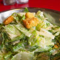 Caesar Salad · Romaine, caesar dressing, shaved parmesan, croutons