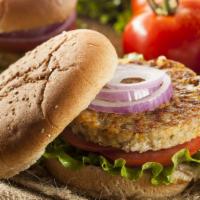 Veggie Burger · Hearty house made veggie patty, fresh lettuce, tomatoes, onions, and mayo served on a fresh ...