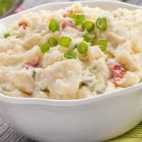 Potato Salad · Hearty potatoes tossed in a mildly spiced mayo mixture.