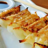 Gyoza 4 Or 8 Piece · Pork and vegetable fried dumplings