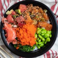 Poke · Sashimi bowl with your choice of salmon or tuna served over rice and choice of 3 toppings