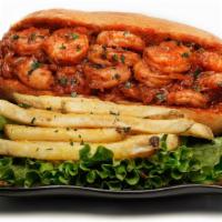 Shrimp Sandwich · Shrimp sauteed in caramelized onion and tomatoes with fries.