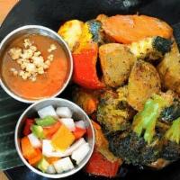 Veggie Satay · Pan-fried seasonal vegetables, mushrooms marinated in curry powder and coconut milk. Served ...
