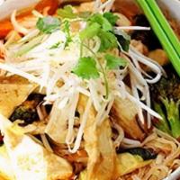 Araya'S Noodle Soup · Wide/thin rice noodles cooked in lime dressing and tom yum paste, clear broth, fried tofu an...