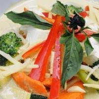 Green Curry · Soft/fried tofu with seasonal vegetables, bamboo shoots, bell peppers. Cooked with green cur...