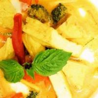 Red Curry · Soft/fried tofu with seasonal vegetables, bamboo shoots, bell peppers. Cooked in red curry, ...