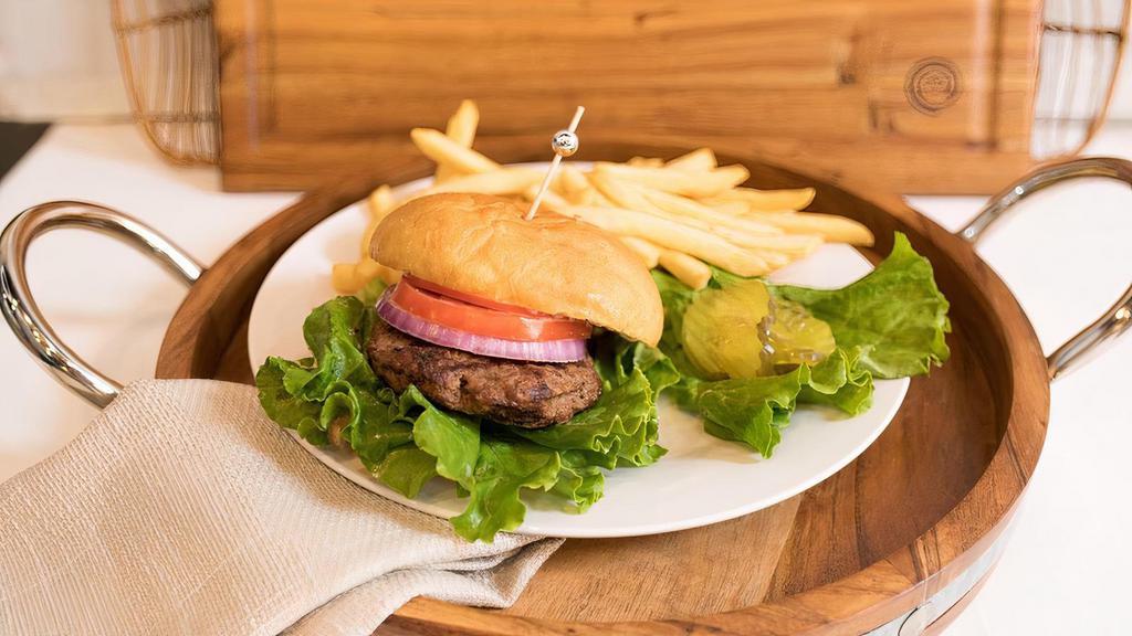 Basic Burger Meal · 6 Oz. Charbroiled Seasoned Angus Ground Chuck Burger. Served w/ Lettuce, Tomato, Onions, & House Sauce. Served w/ a Side of French Fries.