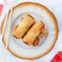 Thai Egg Rolls · Crispy rice paper wrapped with silver noodles, carrots, mushroom, and cabbage, served with o...