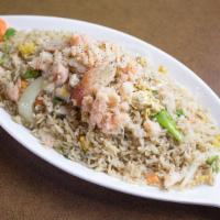 Crab Fried Rice · A Thai favorite fried rice with crab meat, eggs, and cilantro.