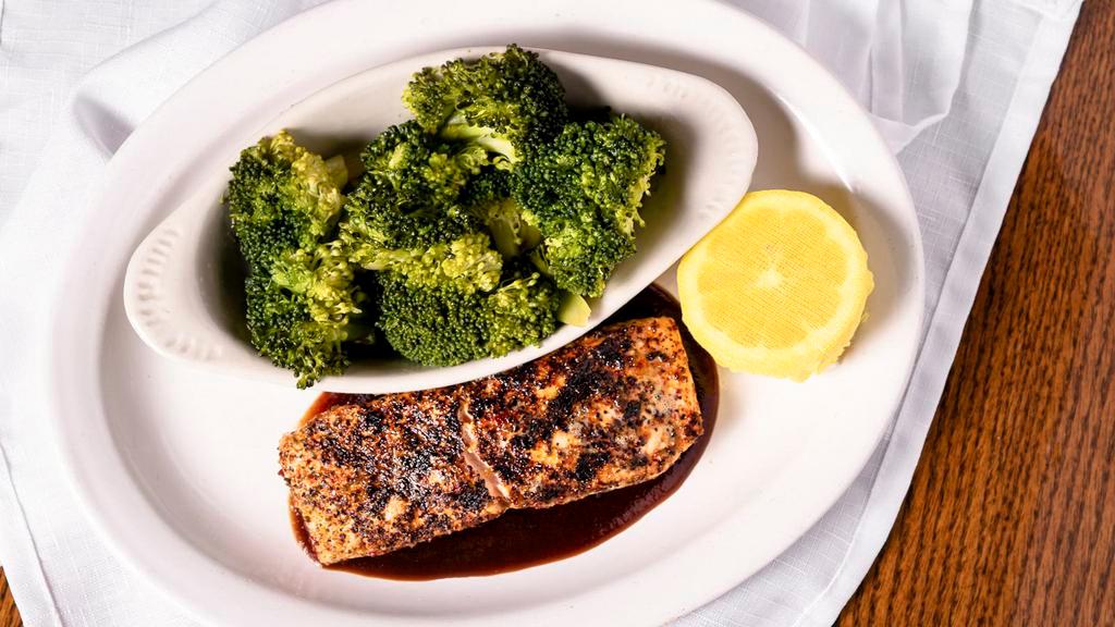 Bbq Peppered Salmon (6 Oz) · Atlantic silver salmon fillet, seasoned with black, red and green peppercorns, grilled to perfection and served on a bed of our famous Ruby BBQ sauce.