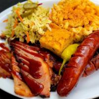 Dual Barrel Platter · Served with  choice of two sides and two BBQ meats.