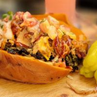 The Loaded Barrel · One whole sweet potato , cheese, pulled pork, BBQ sauce, Pico , spicy greens