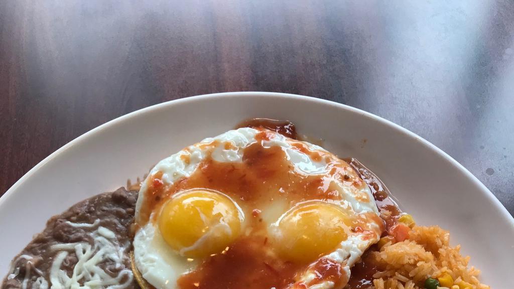 Huevos Rancheros · 2 eggs ranch style. Served with rice, beans, cheese, and tortillas. All eggs are cooked to order, consuming raw, undercooked, and unpasteurized food items may increase your chance of contracting foodborne illness.