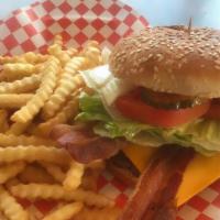 Bacon Cheese Burger · Sesame seed bun with thousand islands beef patty white onions tomatoes lettuce pickles. serv...