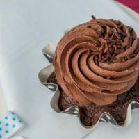 Tall Dark And Handsome · Dark chocolate cupcake with our rich chocolate buttercream, topped with chocolate sprinkles.