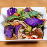 Eggplant · Stir-fried eggplant, bell peppers, white onions, and basil.