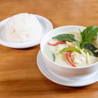 Green Curry · Green curry in coconut milk with bamboo shoots, bell pepper, and Thai basil.