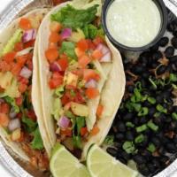 Sweet Pork Tacos · Two flour tortillas filled with sweet pork, mango pico and lettuce. Choice of housemade ranc...