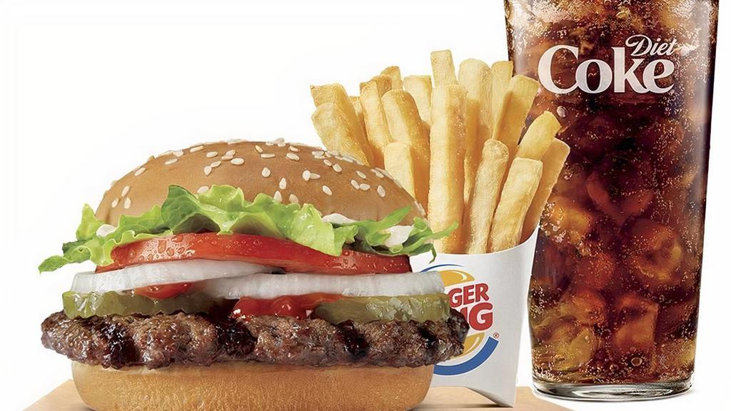 Whopper Jr Combo · Our WHOPPER JR.® Sandwich features one savory flame-grilled beef patty topped with juicy tomatoes, fresh lettuce, creamy mayonnaise, ketchup, crunchy pickles, and sliced white onions on a soft sesame seed bun.  Small Drink and Small Side included.
