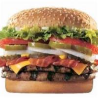 Triple Texas Whopper · Our Triple Texas Whopper features a triplet of quarter-pound savory flame-grilled beef patty...