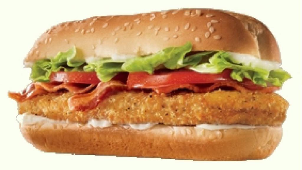Original Chicken Club · Our Original Chicken Club Sandwich is made with 100% white meat chicken filet, seasoned and breaded and carefully layered with thick-cut smoked bacon, American cheese, fresh lettuce, ripe tomato, and creamy mayonnaise on a sesame seed bun.