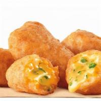Jalapeno Bites 8Pc · Our Jalapeño Cheddar Bites are filled with gooey cheddar cheese and spicy jalapeño pieces, c...