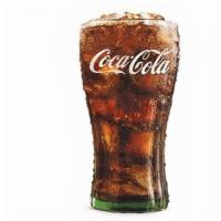 Coke · Perfect with any meal, enjoy the genuine taste of Coca-Cola®.
