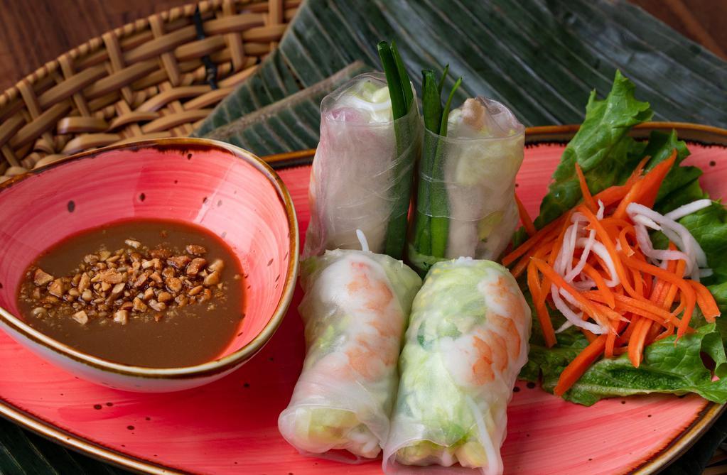 Fresh Spring Rolls · Steamed Shrimp And Pork Wrapped In Rice Paper With Vermicelli, Lettuce, Chives, And Bean Sprouts Served With Peanut Sauce.