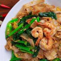 Pad See Ew · Gluten free, vegetarian. Fresh wide rice noodles stir-fried with Chinese broccoli, egg and b...