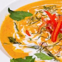 Panang Curry · Panang Curry with coconut milk, bell pepper and lime leaves.