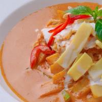 Red Curry · Red curry paste with coconut milk, bell pepper and lime leave