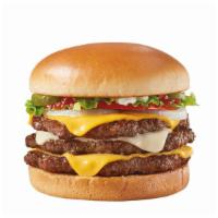 Two Cheese Deluxe 1/2Lb* Triple	 · A Signature Stackburger with three 100% seasoned real beef patties, topped with perfectly me...