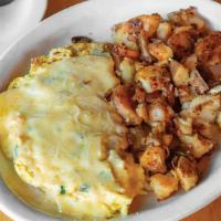 French Omelet · Bacon, mushrooms, scallions, sautéed onion, and Parmesan and Havarti cheese. Served with cho...