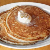 Buttermilk Pancakes · Traditional buttermilk pancakes made from our house scratch recipe