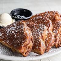 Chompie'S French Toast · Our original “New York” style thick-sliced Challah dipped in batter and deep-fried until gol...